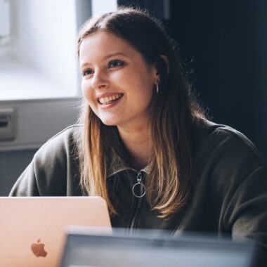 Female Student with Laptop