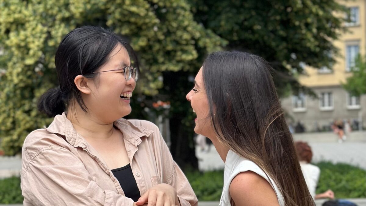 2 empowered women laughing