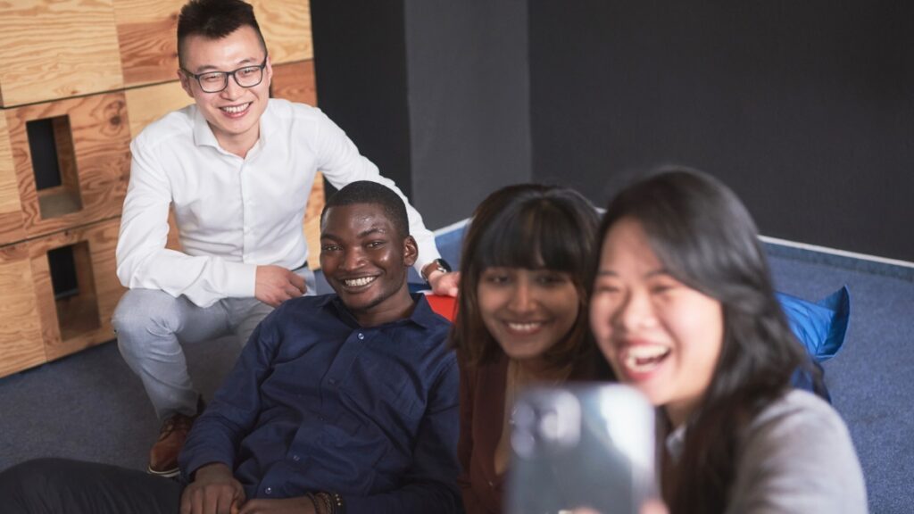 A group of international HHL students smiling and having fun.