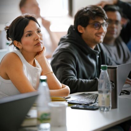 Listening Woman at the AI Workshop