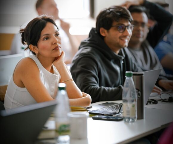 Listening Woman at the AI Workshop