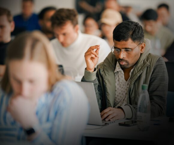 Student looking at his laptop