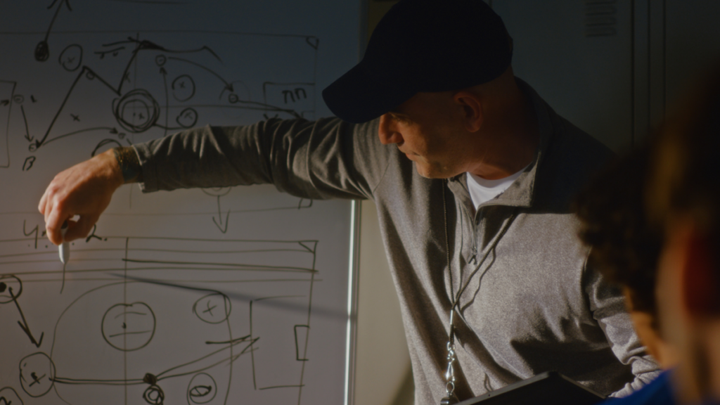 A football coach explains his tactics,