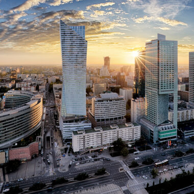Warsaw city with modern skyscraper at sunset, Poland